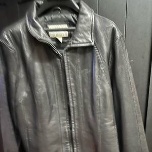 Genuine Wilson Leather jacket. Gently worn, w/small tear (see photos).